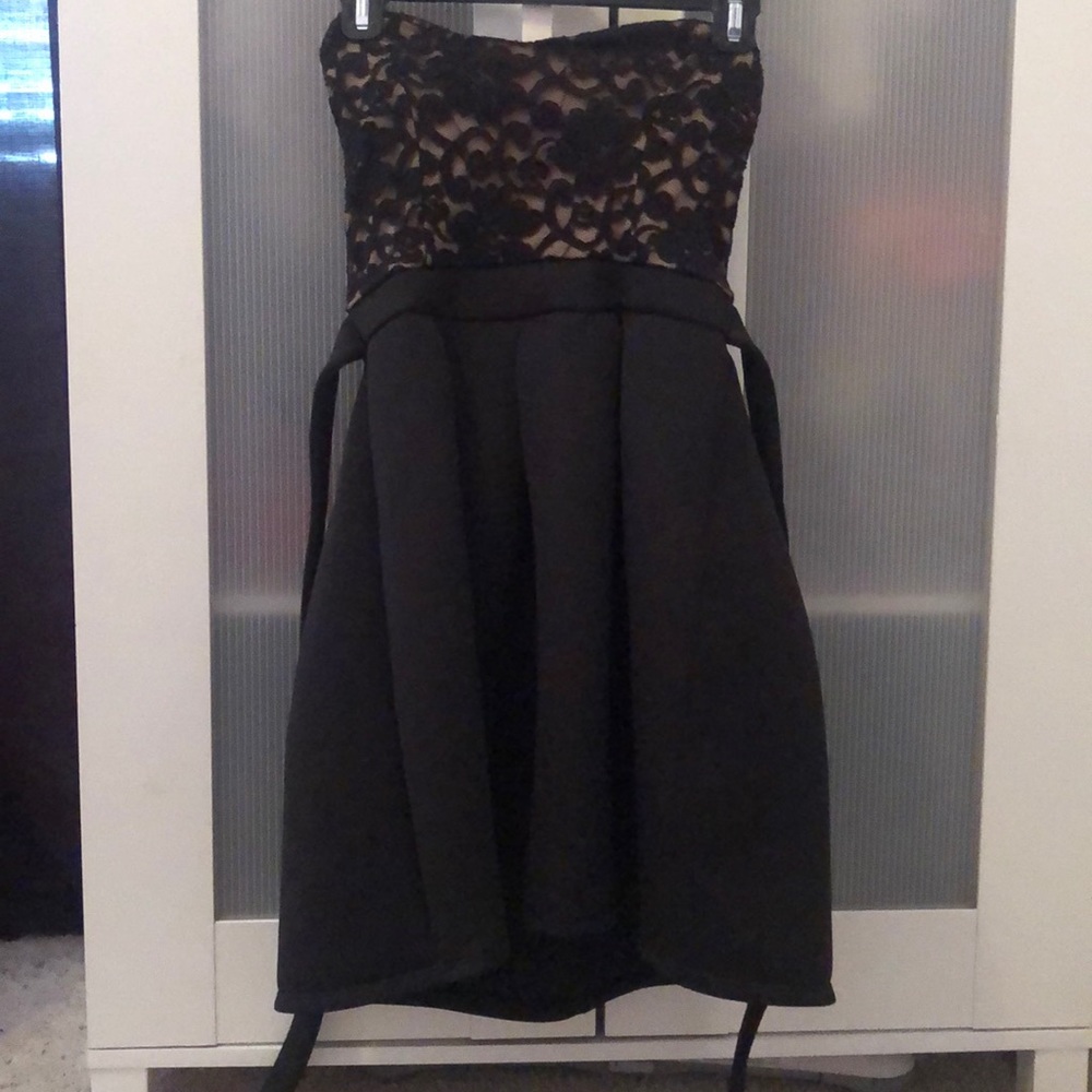 Back and tan strapless dress